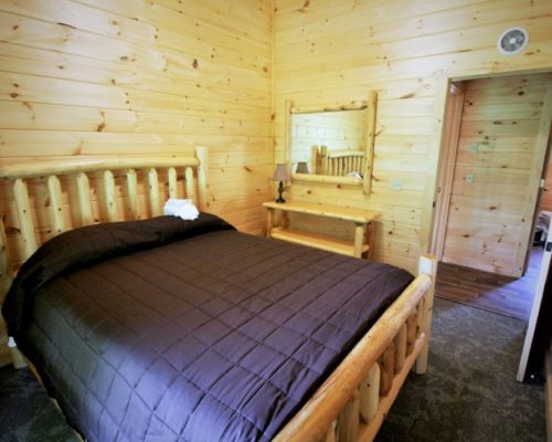 Bedroom in Family Cabin Rentals