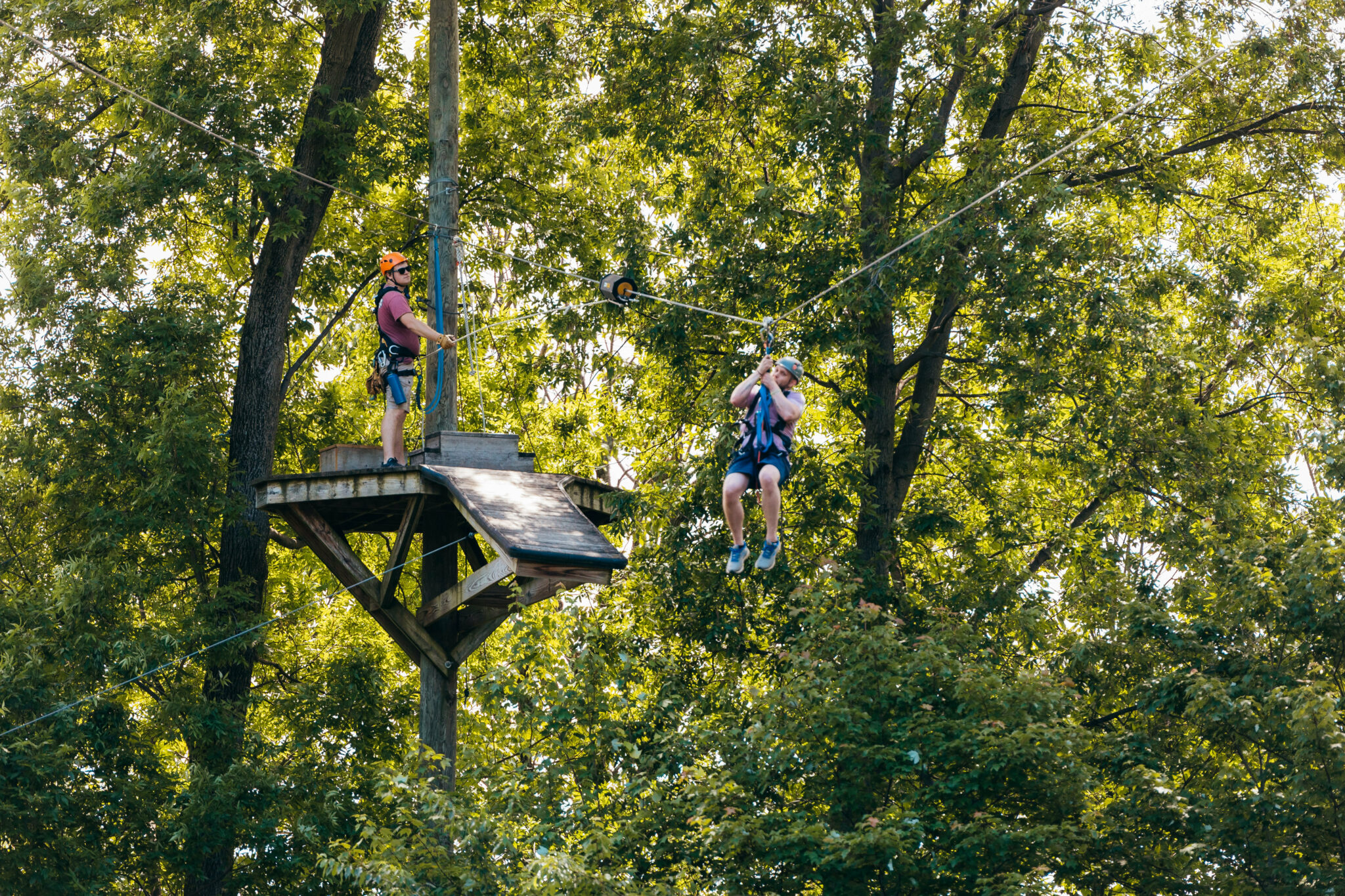 People doing the Refreshing Mountain Zipline Challenge Adventure Tour